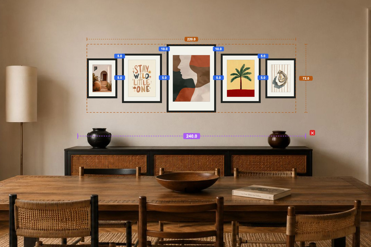 A five-frame symmetrical gallery wall planned in HangPlanner above a console, with the overall width (220 cm), the spacing, and each frame measured out from the centre line on screen